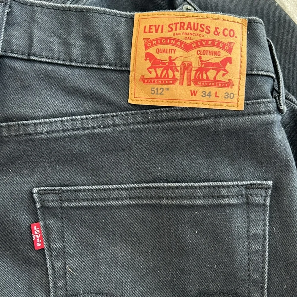 Levi Strauss (Levi’s) charcoal/black, size W34, L30, excellent condition.